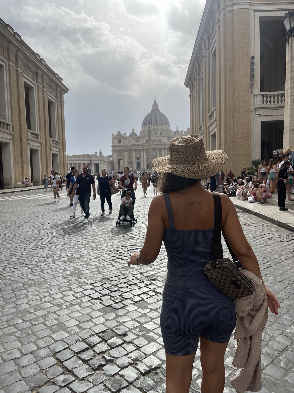 Christina walking toward St. Peter’s Basilica at the Vatican